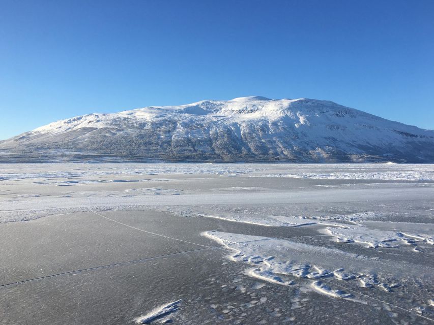 Abisko: Lake Torneträsk Arctic Ice Fishing Trip - Warm clothing makes the difference