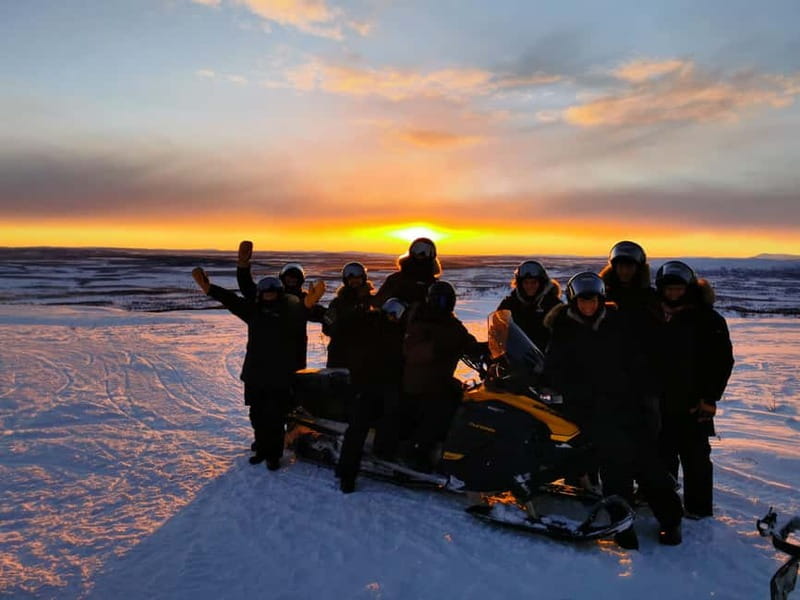 Arctic Dream - Snowmobile Safari to Lapland Viewpoint - Ice fishing on a frozen lake
