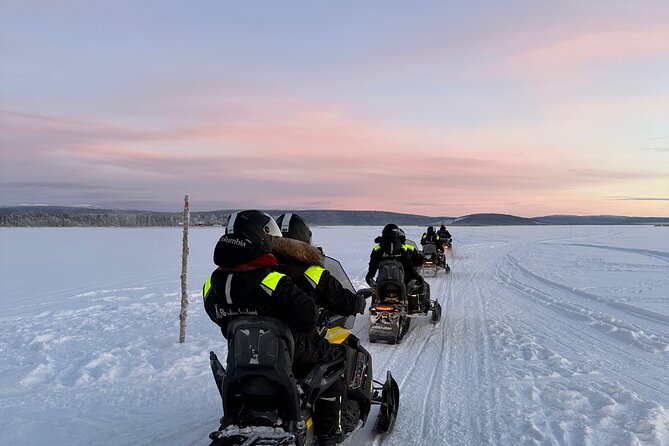 Day tour with snowmobile in Kiruna 10:30 am - Who will enjoy this most?