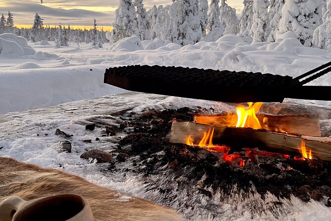 Private snowmobile day tours - Lunch Beside the Fire
