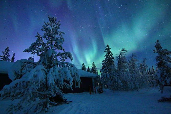 Snowmobile Aurora Expedition with dinner - Getting dressed for real Arctic cold