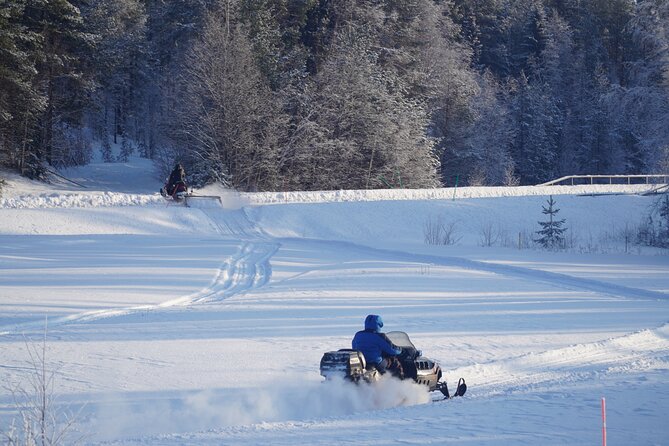 Snowmobile tour - A snowmobile route above Vistträsk
