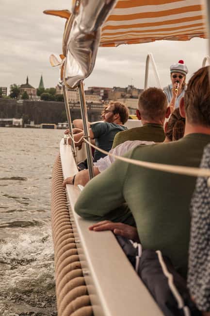 Stockholm: Guided City Sightseeing Open Electric Boat Tour - Guides who make the short ride work