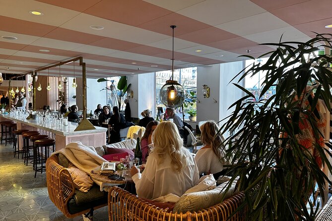 Stockholm Small Group Food Tour with 7 Classic Food Tastings - Walking from Drottninggatan toward Norrmalm